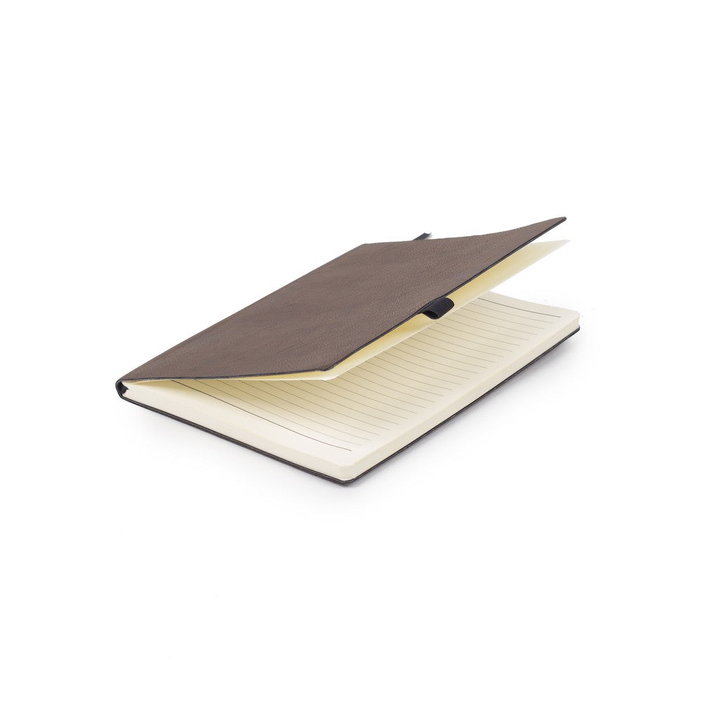 a notebook with a pen on top of it