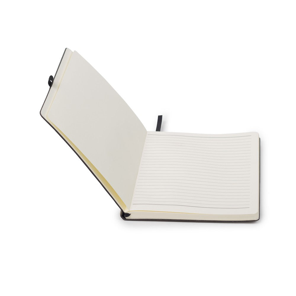 an open notebook with a pen on top of it