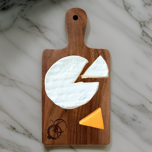 a cutting board with a cheese board on it