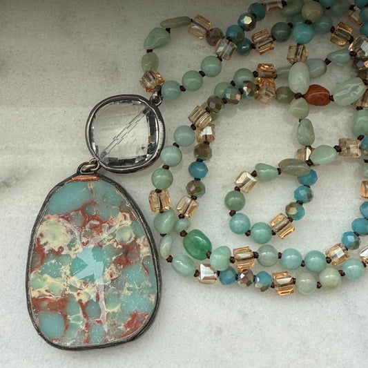 Bohemian vintage style glass knot necklace with engraved firedancer